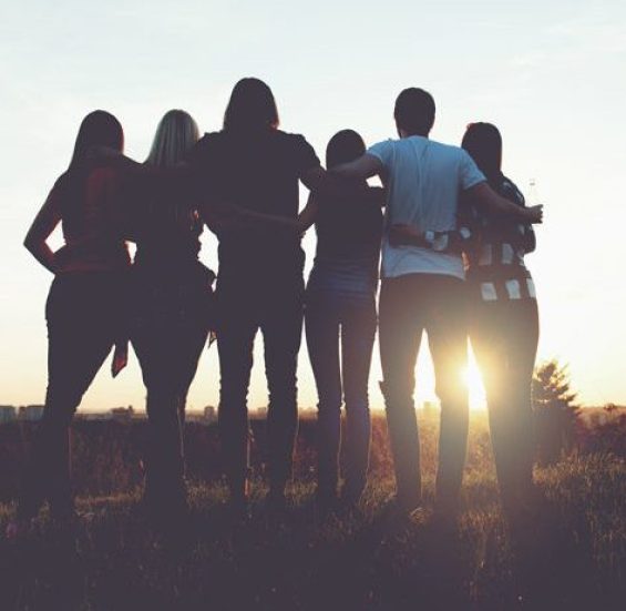 People looking at sunset