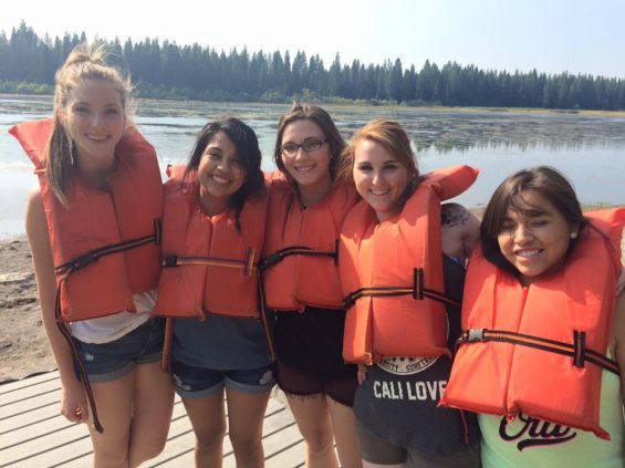 Group photo of people wearing life vests