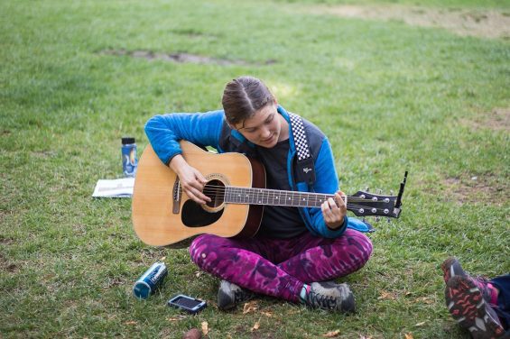 Person playing guitar