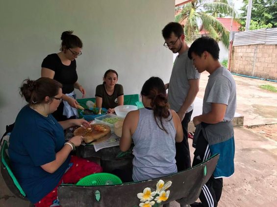 People eating around table