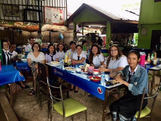 People eating around table