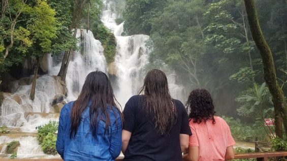 People looking at waterfall