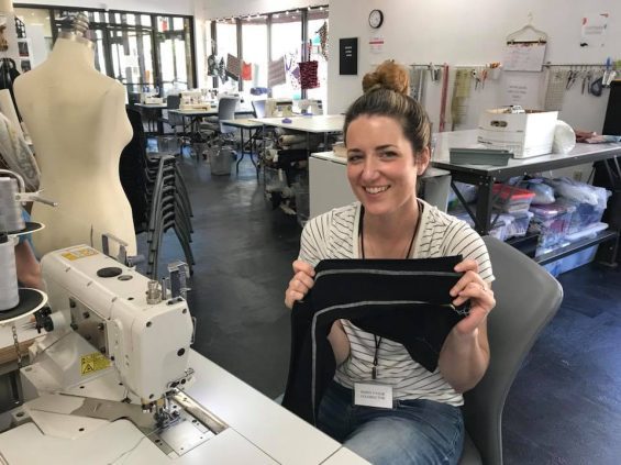 Person working at sewing machine