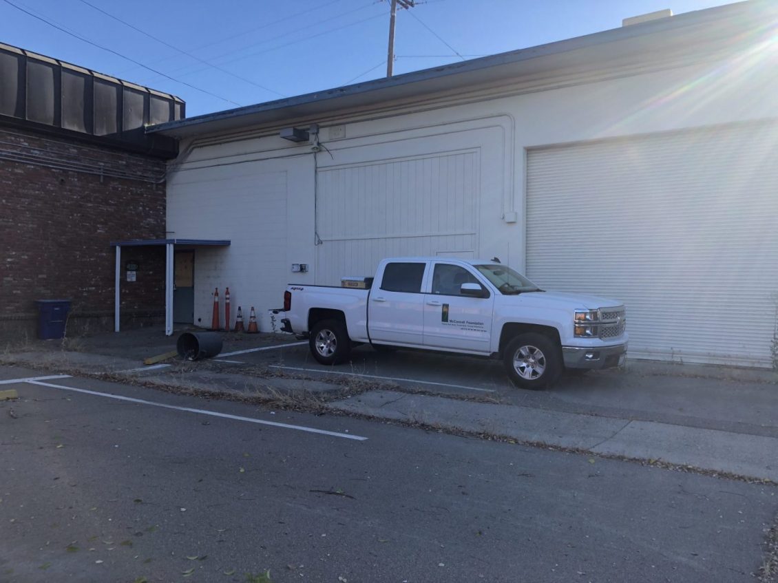 Truck in front of building