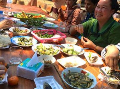 People around a table eating