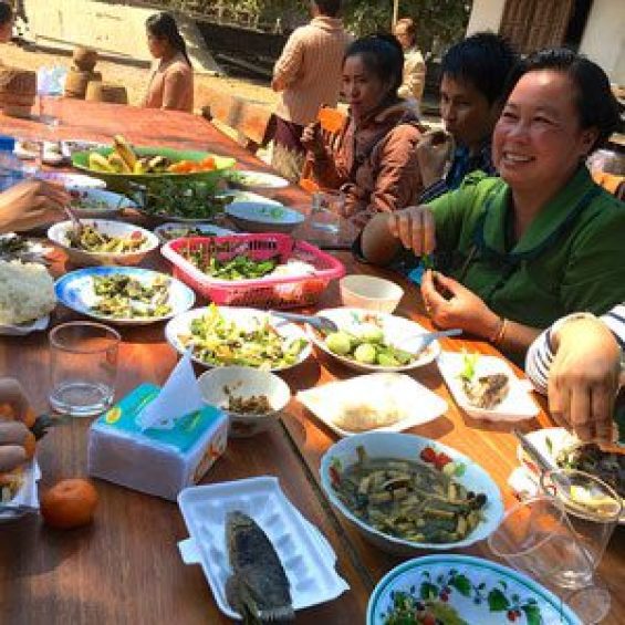 People around a table eating