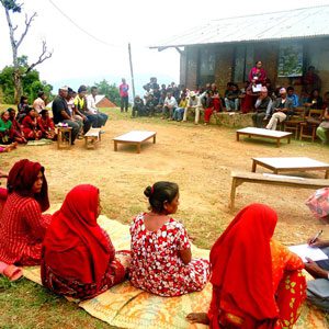 People in Nepal sitting in circle
