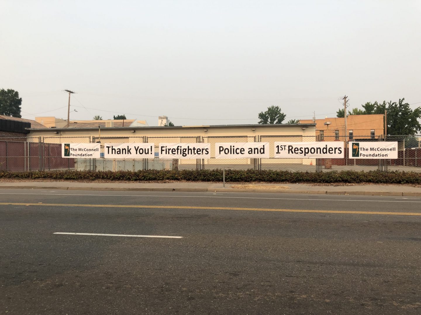 Thank you first responders sign on fence