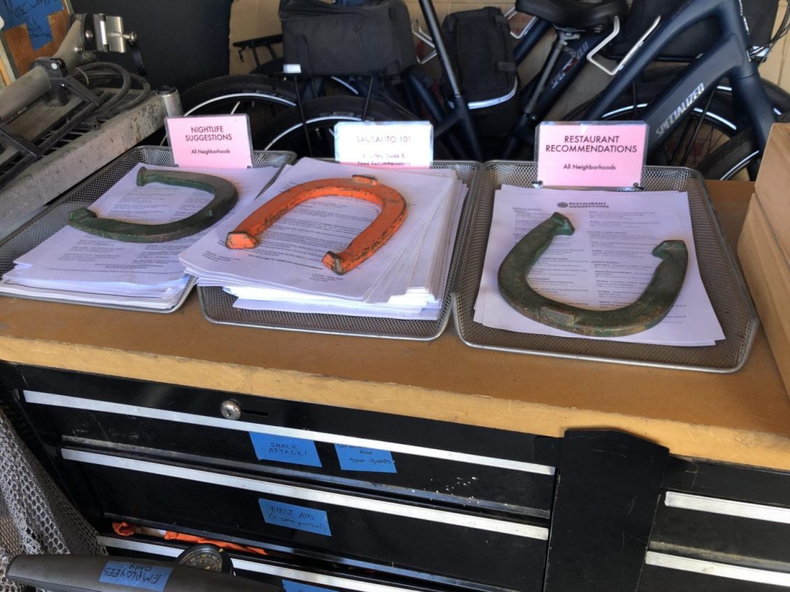 Horse shoes being used as paper weights