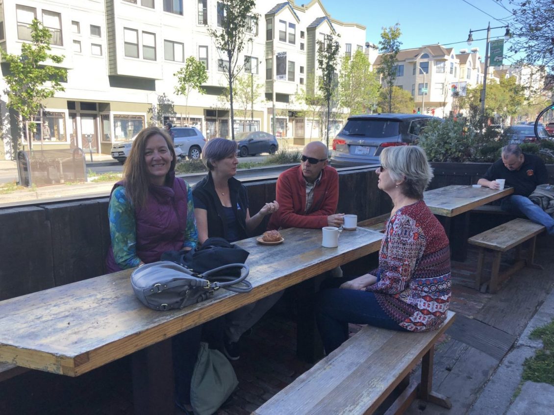 People sitting at parklet