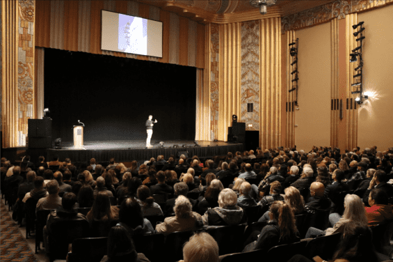 Person speaking at event