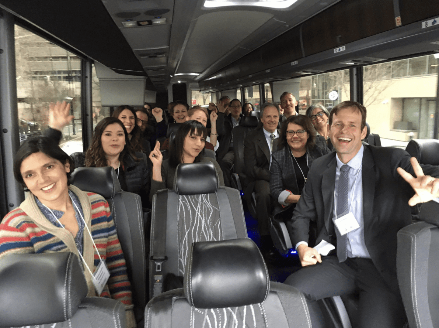 Group photo of people in a bus