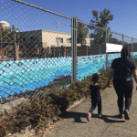 fence with art on it