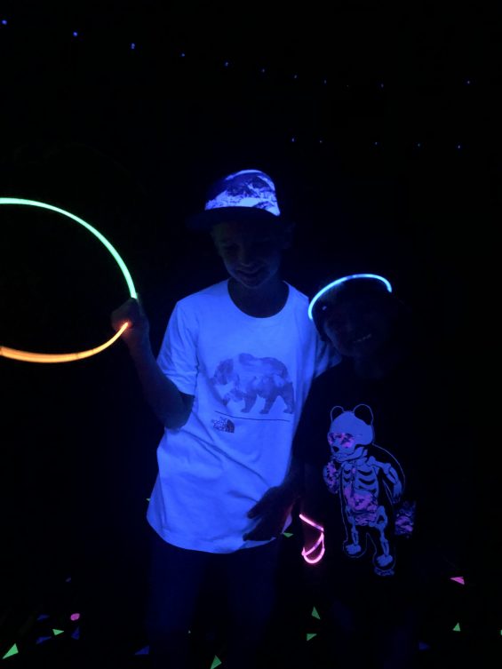 People wearing glowsticks