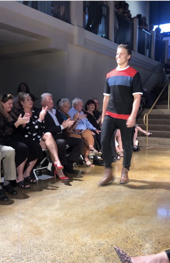 Man walking down fashion show runway