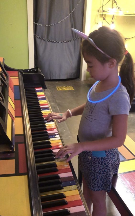 Child playing piano