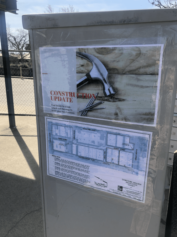 Construction update flyers on post box