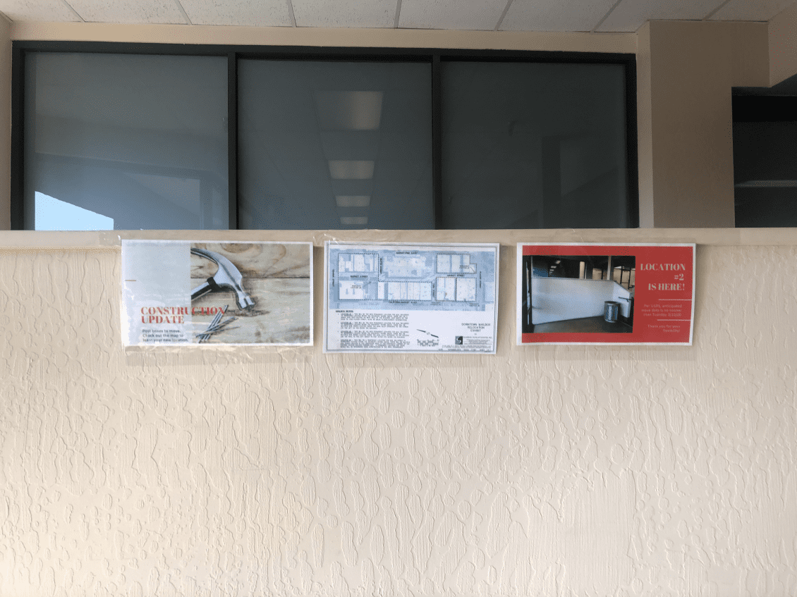 Construction update flyers on wall