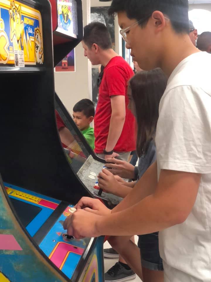 Person playing arcade game