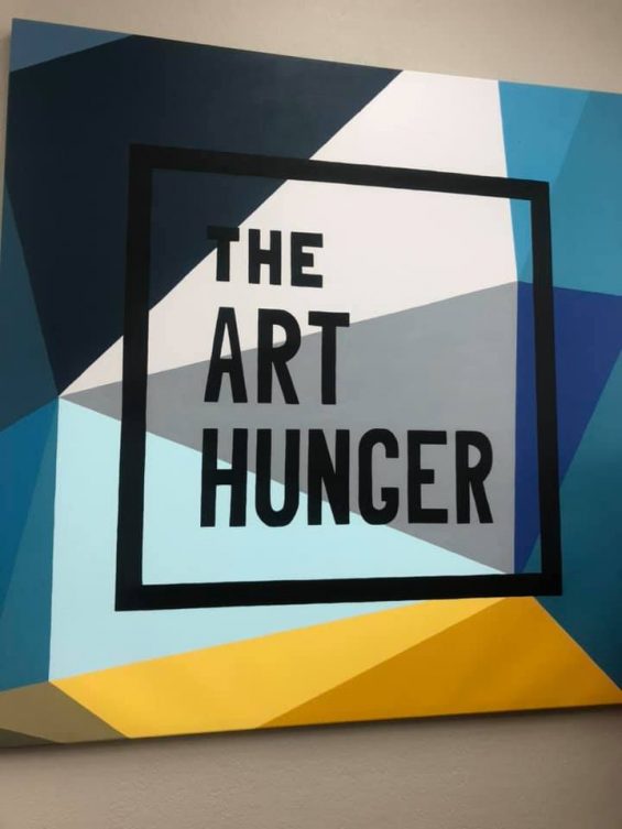 painting of the art hunger logo